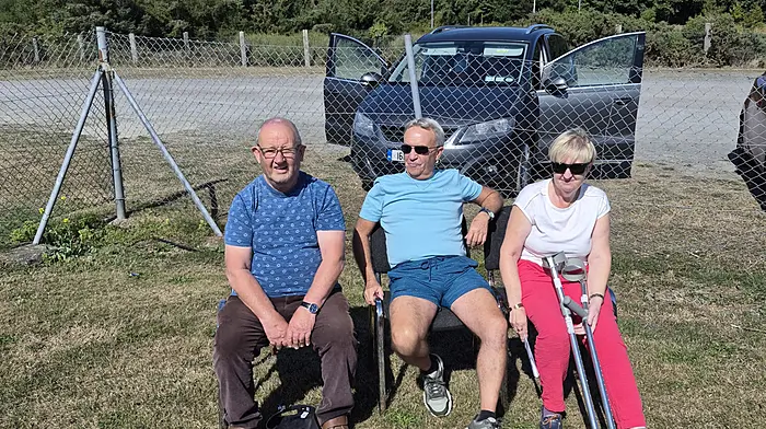 Christy Desmond, Martin Eaton and Ursula Eaton relaxing before the Tracton and Cloughduv game in Belgooly last Saturday.
