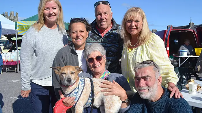 Locals Maria, Jim and Pinto Kennedy (Skibbereen) and Michelle McCormack (Baltimore) with visitors Erin McCartin  (Australia) and Guido Vais and Clara Lombardo (Sicily) having a wonderful sunny time at Skibbereen's Farmers Market.   (Photo: Anne Minihane)