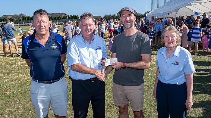 Saturday August 22nd marked the final day for the Kinsale GAA pitch on the Bandon Road and a party was organised to say farewell. At the event,  Ger Webb (club chairman) and Cian Quigley presented a cheque for €1,100 to Kevin Gould and Sheila Gould of the Kinsale RNLI. The cheque was raised at the Tom Quigley Poc Fada competition held in February .  (Photo: John Allen)
