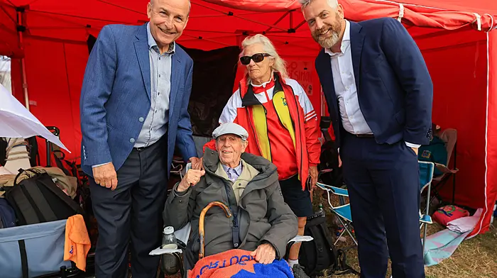 An Taoiseach Micheál Martin and Minister for Heritage Christopher O'Sullivan, TD, meeting Ian and June Tattersall, Kilmacsimon Quay, at the official opening ceremony. (Photo: Valerie O’Sullivan)
