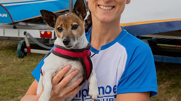 The All-Ireland Coastal Rowing 2026 championships took place in Bantry last weekend and attracted huge crowds. Amongst the spectators were Jacinta Buckley with Charlie the dog.(Photo: Andrew Harris)