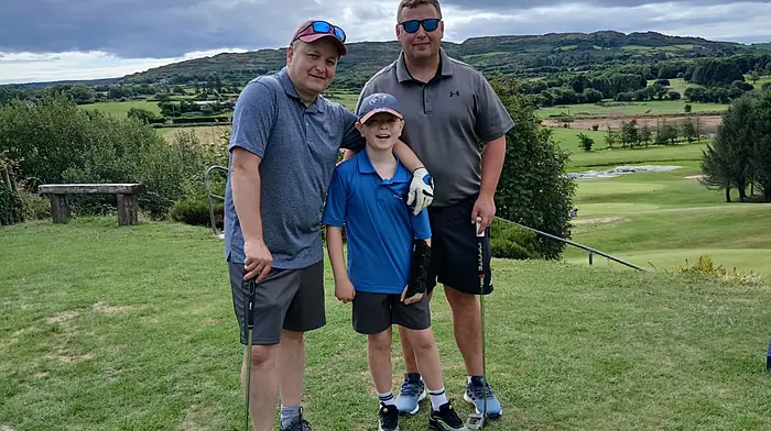 Daire Calnan with his uncles Gearoid and Finbarr.