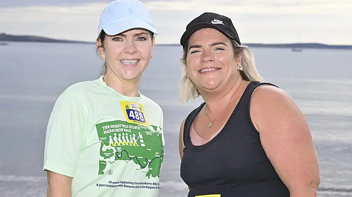 Caroline Whelton, Courtmacsherry (left) and Ellen Buckley (Lislevane) pictured passing Broadstrand Beach during the Courtmacsherry RNLI Great Wild Atlantic Marathon Walks on Sunday last. Photo: Martin Walsh.