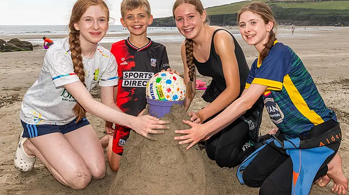 Rosscarbery, West Cork, Ireland. 12th Aug, 2026. Rosscarbery Family Festival held a sandcastle & Sculpture Competition on the Warren Beach today, with well over 100 teams and individuals entered into the competition. Pictured with their sculpture of the FIFA World Cup are Aisling Lynch; Rían O'Keeffe; Sadie Hourigan and Ciara Lynch, all from Glandore. Picture: Andy Gibson.