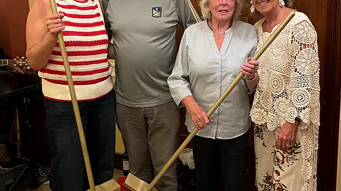 Enjoying the Clonakilty Tidy Towns Summer BBQ and being presented with their Golden Brush Awards are Liina Veski, Diarmuid Cregan (joint chairperson), Thelma Barry, and Roni Coomey.