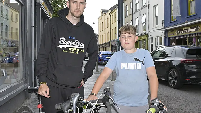 Locals Denis (left) and Toby Williamson with their bicycles on Astna Street, Clonakilty.   (Photo: Martin Walsh)