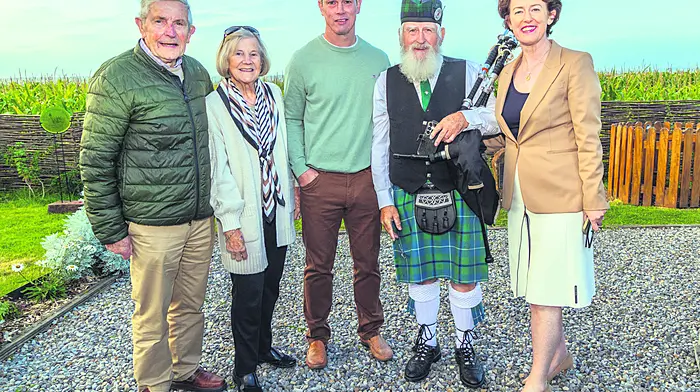 “Kinsale Remembers,” (L to R), At the remembrance ceremony at the Ringfinnan Garden of Remembrance near Kinsale, former Town Mayor Dermot Collins along with his wife Breda, John Murphy representing the Murphy family, event piper Frank Brady and Cllr Gillian Coughlan. (Gearóid Holland).