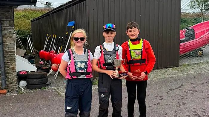 The winners of the Ross Barnett Memorial Trophy and the gold fleet winners were Aidan O’Driscoll and Hugh Fitzmaurice, with Lucy Copithorne who presented the prizes.