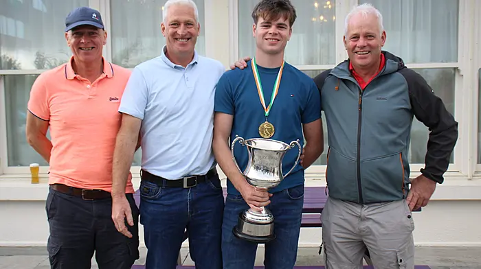 Eoin Hurley, All-Ireland Novice 1 road bowling winner, with his dad Johnny and uncles Gerard and Fachtna Hurley in Westport, County Mayo.