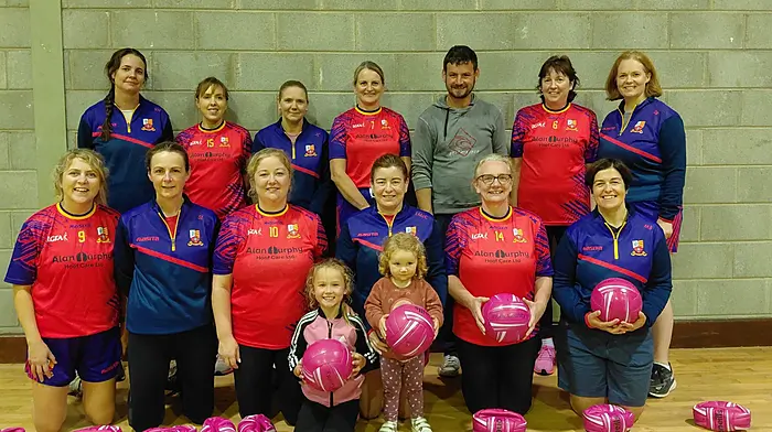The Murphy family of Alan Murphy Hoof Care Ltd presenting a supply of new footballs to Tadhg MacCarthaigh Gaelic for Mother's & Others Club. Back: Vicky Hurley, Fiona Murray,  Julie Crowley,  Mags Harrington, Alan Murphy, Imelda Mulhall and Deirdre Barry. Front: Siobhan O'Regan,  Sheila Lynch,  Suzie Murphy, Ruby Murphy, Millie Murphy,  Lisa McCarthy,  Louise O'Sullivan and Mags Buckley.