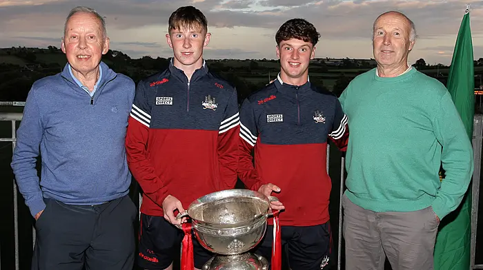 Fionn O'Donovan and Tom Whooley with former Cork minors Dave McCarthy and Pa McCarthy. (Photo: Paddy Feen)
