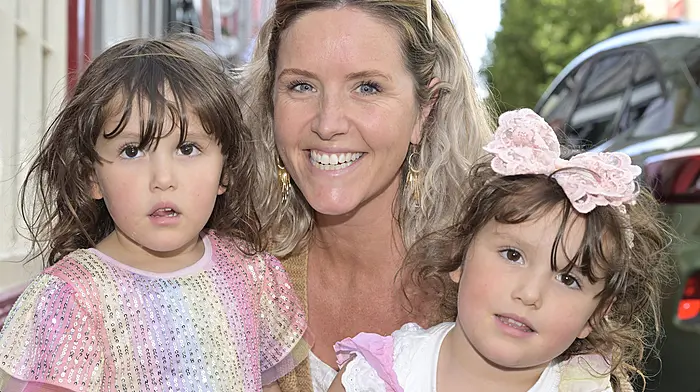 Clonakilty's Orla Sheehy with her daughters Ayah (left) and Esme out and about during the Clonakilty Guitar Festival. Photo: Martin Walsh.