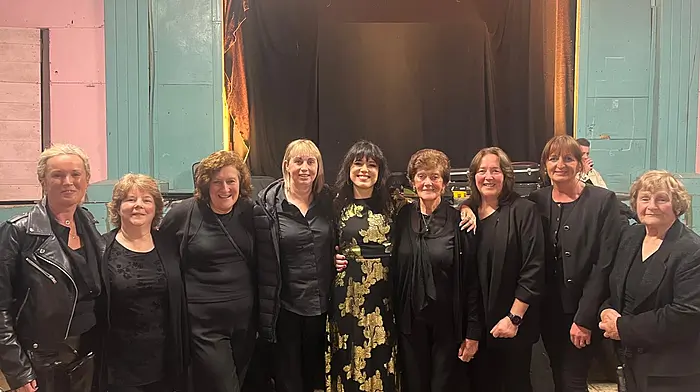 Imelda May with the Bere Island choir.  Imelda performed on the island last weekend as part of the Bere Island Arts Festival. From left: Dr Eva McMullan Glossop (department of music UCC), Mary Mullins, Christine Barry, Catherine Sullivan, Imelda May, Finola Crowley, Joanne Sullivan, Sheila Walsh and Brenda Eplhick.