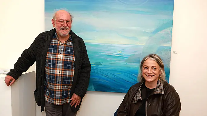 At the launch of the Land & Sea exhibition at The Blue House Gallery, are photographer and artist Geoff Geenham and artist Patricia Bevan.   (Photo: Carlos Benlayo)