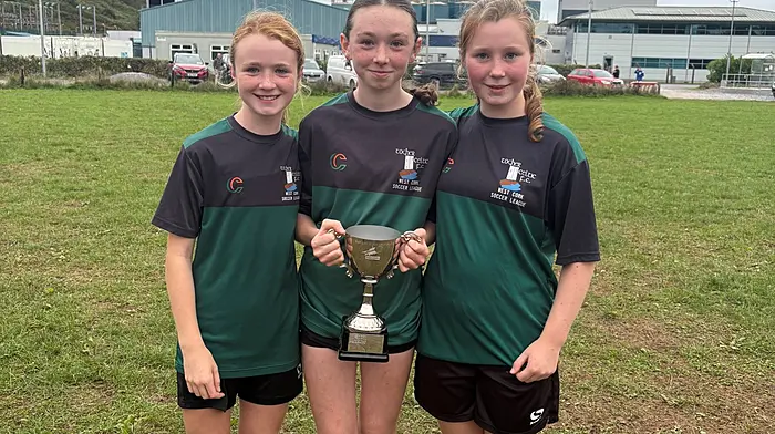 Saoirse O’Donovan, Molly Lyons, Aoibheann O’Donovan with the SuperValu girls U14 league perpetual cup.