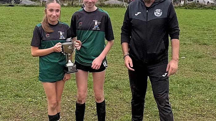 Joint captains Faye Buston and Molly Lyons with Mike Burgoyne, fixtures secretary for West Cork schoolboys and schoolgirls league (WCSSL).