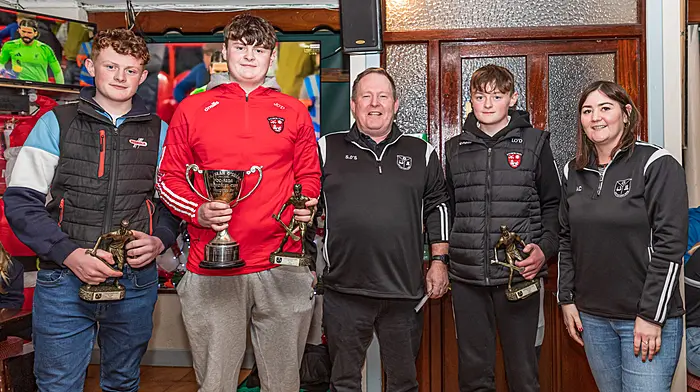 The overall winner of this year’s Castletownbere GAA annual Poc Fada were James, Daniel and Liam O Donovan. They were presented with their prizes by chairperson Sean O’Sullivan and secretary Amanda Cronin. From left: James O’Donovan, Daniel O’Donovan, Sean O’Sullivan, Liam O’Donovan and Amanda Cronin.   (Photo: Anne Marie Cronin)