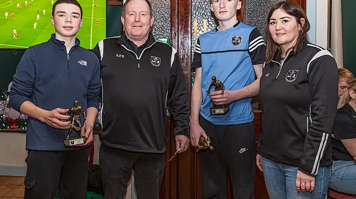 In second place at this year’s Castletownbere GAA’s annual Poc Fada were Oisin O’Sullivan, Charlie Hannigan, and Luke McNeil.  They were presented with their award by chairperson Sean O‘Sullivan (chairperson) and Amanda Cronin (secretary).    From left: Charlie Hannigan, Sean O’Sullivan,  Oisin O’Sullivan and Amanda Cronin.  (Photo: Anne Marie Cronin)