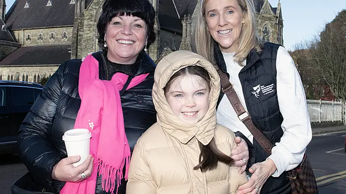 Beaming New Year smiles from Ann and Lydia O'Mahony and Kristine Meenaghan, all from Rossmore, who met up in Clonakilty.   (Photo: Martin Walsh)