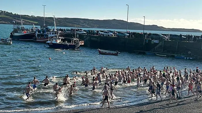 Some of the swimmers who braved the elements on Christmas Day to take part in the annual Christmas Day swim in Schull.
