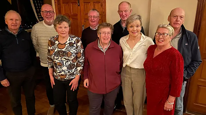 Enjoying a catch up at the reunion were (back) Anthony Murphy, Gerard Corcoran, Donal Foley, Tony Murphy and John Patterson. Front: Mary Crowley, Maura O'Mahony, Eleanor McSweeney and Helen Hurley.