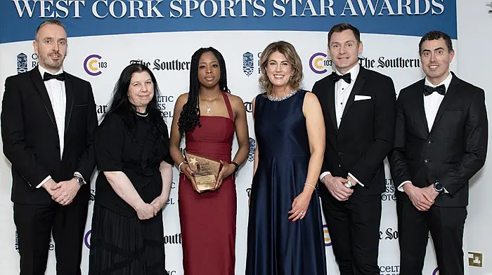 Rising athletics star Adaora Nnaemeka, who won the Paudie Palmer West Cork Sports Youth Award, with, from left, Kieran McCarthy (Sports Editor, The Southern Star), Ann Downey (manager, Celtic Ross Hotel), Helen Wycherley (Celtic Ross Hotel), David Gillick (special guest) and John Paul McNamara (C103). (Photo: Martin Walsh)