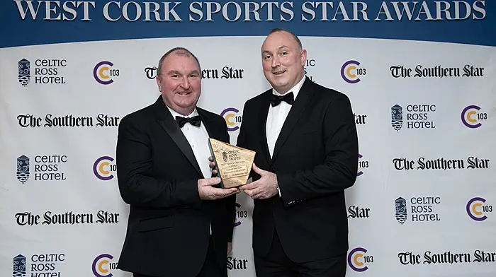 Kilmacabea's William Williamson and Barry Glavin with the Club of the Year award. (Photo: Martin Walsh)