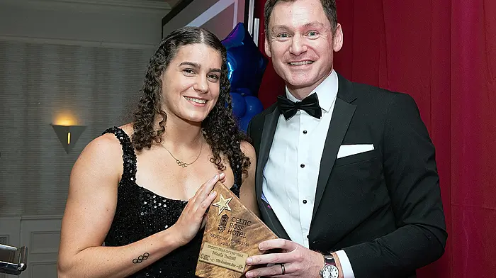 Nicola Tuthill is presented with her award by special guest David Gillick. (Photo: Martin Walsh)