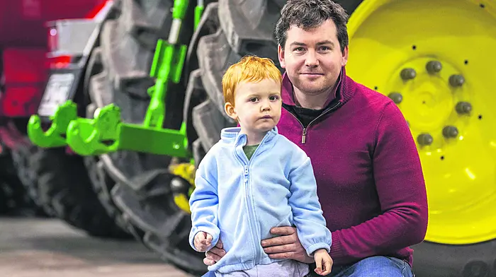 Two-year-old Hector O'Connell and his dad Jonathan O'Connell from Macroom enjoying the spring farm machinery show which was held recently.  The show is a complete showcase of farm machinery, technology and agri-services and is Munster’s leading farm machinery exhibition.   (Photo: Andy Gibson)