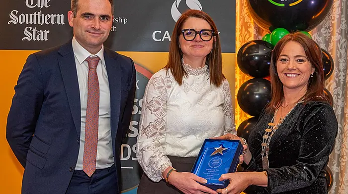 Cllr Caroline Cronin, deputising for the Mayor of the County of Cork, presenting Paudie and Eibhlín Keohane of Keohane Readymix with the Best Family-Run Business award, sponsored by Cork County Council.