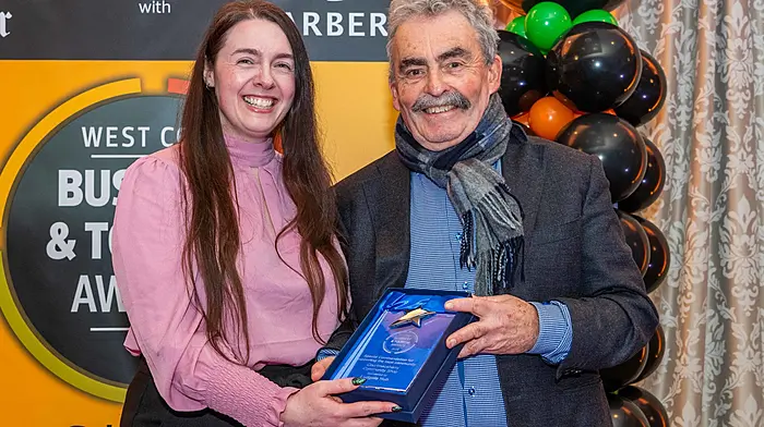 Denis Cahalane accepting the Special Commendation for supporting Local Community on behalf of Courtmacsherry Community Shop from Katy Wareing of Ludgate, category sponsor.