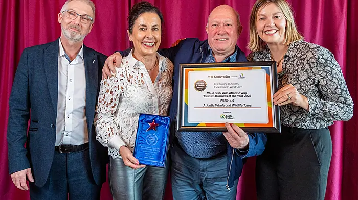 Don Colbert and Gillian Foley (left and right of photo) of category sponsor Fáilte Ireland presenting the West Cork Wild Atlantic Way Tourism Business of the Year award to Mark and Patricia Gannon of Atlantic Whale and Wildlife Tours.