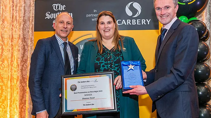 Paul Di Rollo, awards judge, and Neil O’Regan, Director, The Southern Star, presenting Genevieve Sheehan of Sheenco Travel with the award for best pitch at the Pitch Night which was held last December.