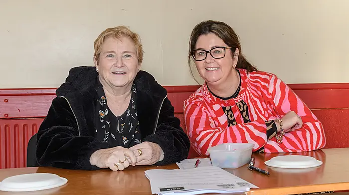 Maureen Power, Templemartin, with Jennifer O'Donovan, Newcestown, registering drivers at the Newcestown tractor run. (Photo: David Patterson)