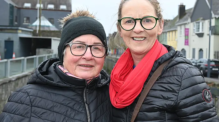 Frances McCarthy (left) and Pauline Murphy  having a chat on Bridge Street.  (Photo: Martin Walsh)