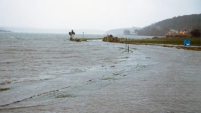 The Courtmacsherry to Timoleague road was flooded at a number of locations last Monday evening as pictured at Ballinomona Cross.   (Photo: Martin Walsh)