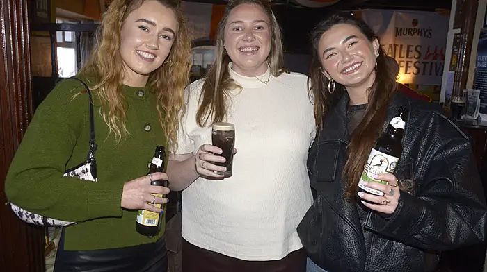 Kinsale girls Siadbh Fitzgerald, Julie O'Connell and Triona O'Shea at  Sam’s Bar during the Beatles festival.   (Photo: Denis Boyle)