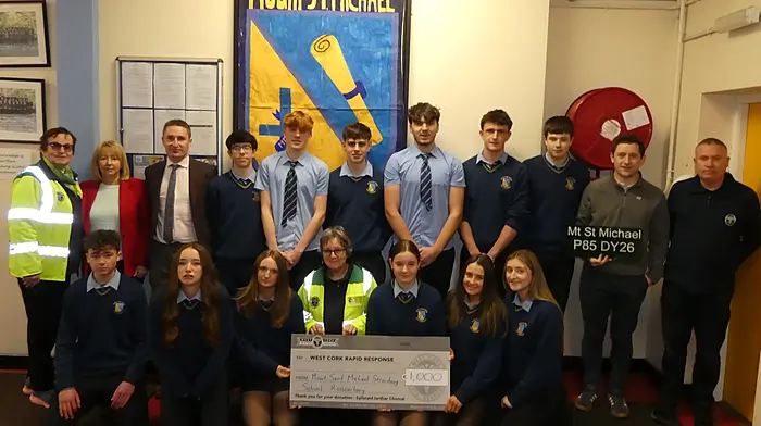 At Mount St Michael's secondary school on the occasion of the presentation of their €1,000 donation to West Cork Rapid Response, the proceeds of two fundraising bake sales at school, are (back): Betty Hennessy (WCRR), Mary Calnan (year head), Stephen Murray (principal), David O'Mahony, Henrick Schnell, Seán Sheehy, Darragh O'Donovan, Gavin Anderson, Jamie Buchanan, James O'Sullivan (engineering teacher) and Liam Slattery (WCRR). Front: Conor Kingston, Clíona O'Brien, Stella Callaghan, Kate Crowley (WCRR), Cara Connolly, Ellie Curtin and Sophie O'Donovan.