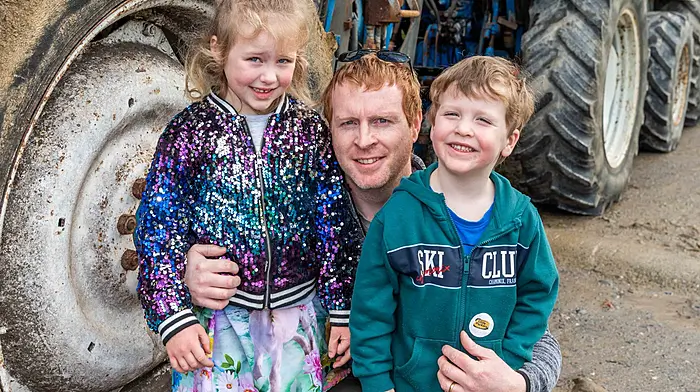 Sheila, Mark and John O'Donovan from Ballinspittle enjoying some time at the tractor, car, truck and motorbike run which was held last Sunday.  (Photo: Andy Gibson)