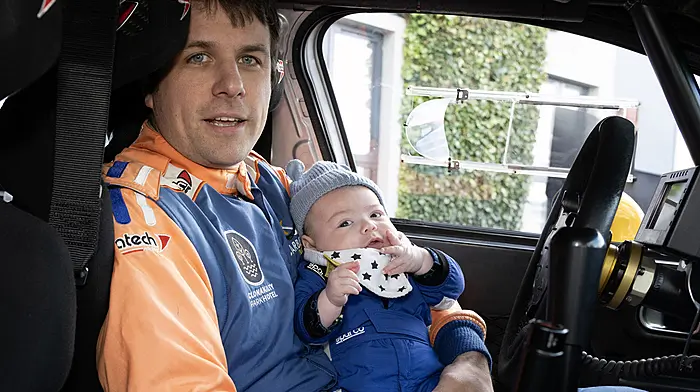 Clonakilty rally driver Cal McCarthy with his three-month old son Ben at the launch of the Clonakilty Park Hotel West Cork Rally last Sunday.  (Photo: Martin Walsh)