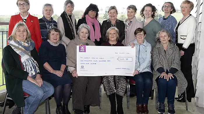 Following their very successful craft stall prior to Christmas in the Alley Garden, members of the Clonakilty Women's Shed presented the proceeds of €1,465 to Clonakilty Meals on Wheels at a gathering in the Clonakilty GAA complex in Ahamilla last week. Front: Anne Kiernan, Maria Hennessy, Norma O'Sullivan (Clonakilty Meals on Wheels), Rose Marie Dempsey, Bernie Harrington (Clonakilty Meals on Wheels) and Maureen Griffin. Standing: Linda Evans, Margaret Duggan, Mary Quinn, Clare Cunningham, Vera Dowling, Anne Cooper, Kendra O'Sullivan, Marian Cadogan and Joan Stapleton.   (Photo: Martin Walsh)