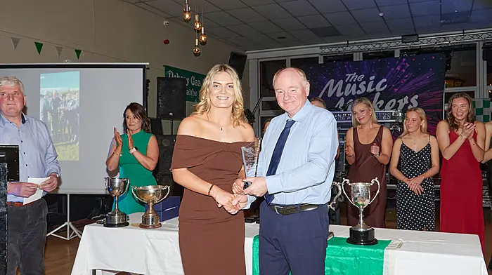 Joe Carroll, Cork senior ladies football manager, presenting Ava O'Donovan with the Doheny ladies Player of the Year award for 2025 at the recent Doheny victory social.  Photo courtesy of Noel M photography.