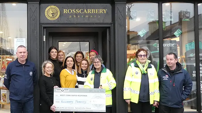 Rosscarbery Pharmacy staff presenting West Cork Rapid Response with €500, the proceeds from their Christmas raffle which was held in memory of Diarmuid Manning. Front: Liam Slattery (WCRR), Claire Powell, Noelle Madden, Alona Mialkovska, Kate Crowley (WCRR), Betty Hennessy (WCRR) and Aodh O'Donnell (WCRR).  Back: Aoife O'Mahony, Michelle Lynch, Shelley Daly and Alannah Prendergast.