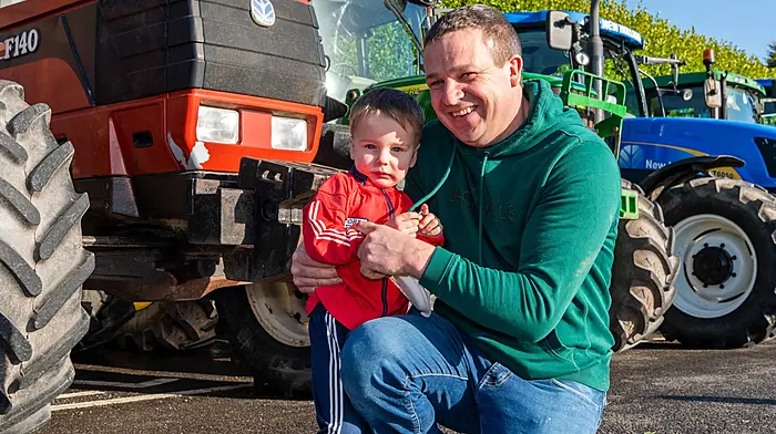 At the recent tractor run in Newcestown which was organised by the Father Ted crew as part of the Newcestown Film Awards were Harry and Billy Quinlan from Canovee.   (Photo: Andy Gibson)