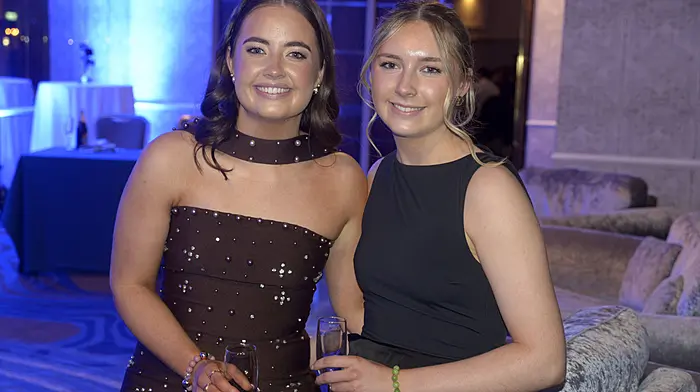 Sisters Aoife and Eimear Casey celebrating the Ballinhassig GAA Premier Intermediate hurling champions. (Photo: Denis Boyle)