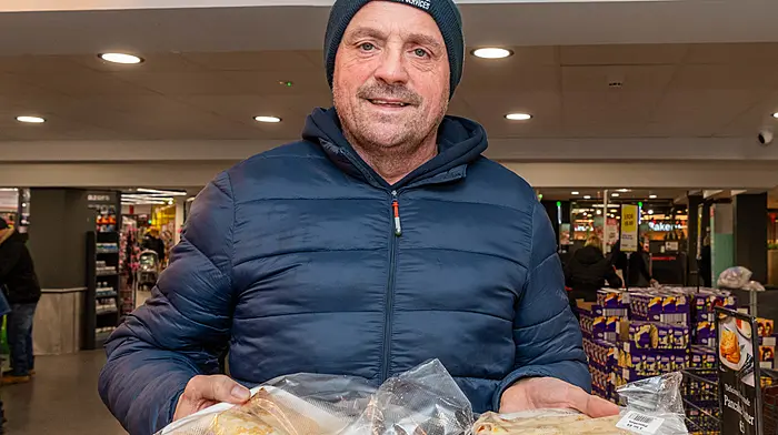 Denny Collins from Skibbereen, with his freshly-made pancakes from Fields'. (Photo: Andy Gibson)
