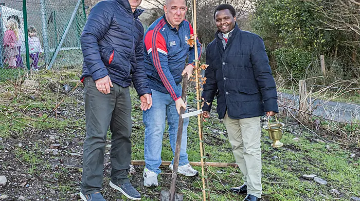 John and Joeseph Blake with Fr Amos Planting one of three trees to mark the past present and future of Trafrask National School., as they celebrate their 175 Anniversary  Picture: Anne Marie Cronin Photography
