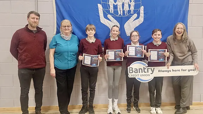 The pupils of Dromore National School were winners in the U13 category at the Bantry Primary Schools Credit Union Quiz which was held recently at Coláiste Pobail Bheanntraí.  Included in the photo are: Kevin Mulcahy (principal), Christina Andrews (staff member, Bantry Credit Union), Philip McCarthy, Aoife Barrett, Cadhla O'Regan, Odhrán Crowley (quiz team) and Eleanor Fitzgerald (vice-chair of the board, Bantry Credit Union).