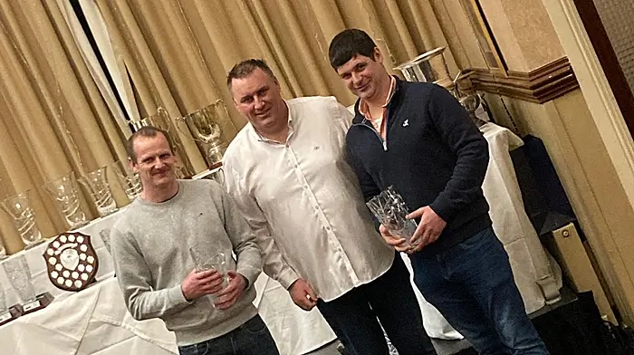 Driver Donie O’Brien (Schull) and co-driver Kieran Daly (Drimoleague) receiving their prize from Steve Davis, Clerk of Course, after winning Class 9 in the West Cork Rally last weekend.