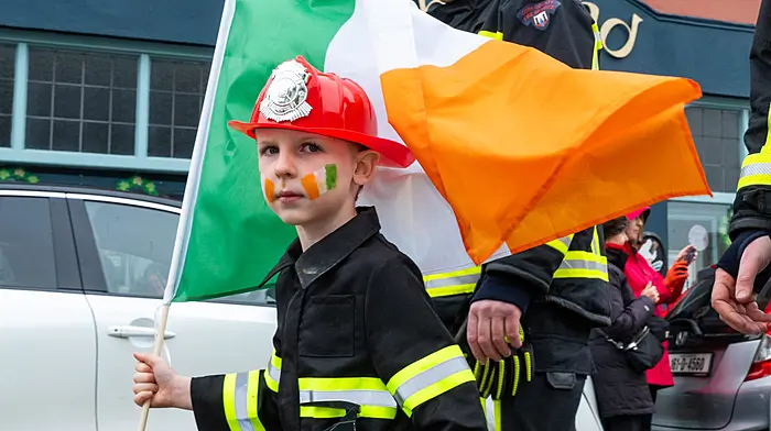 Lewis McEnery marching with the Kinsale Firefighters at the annual Kinsale St Patrick Day parade.  (Photo: John Allen)